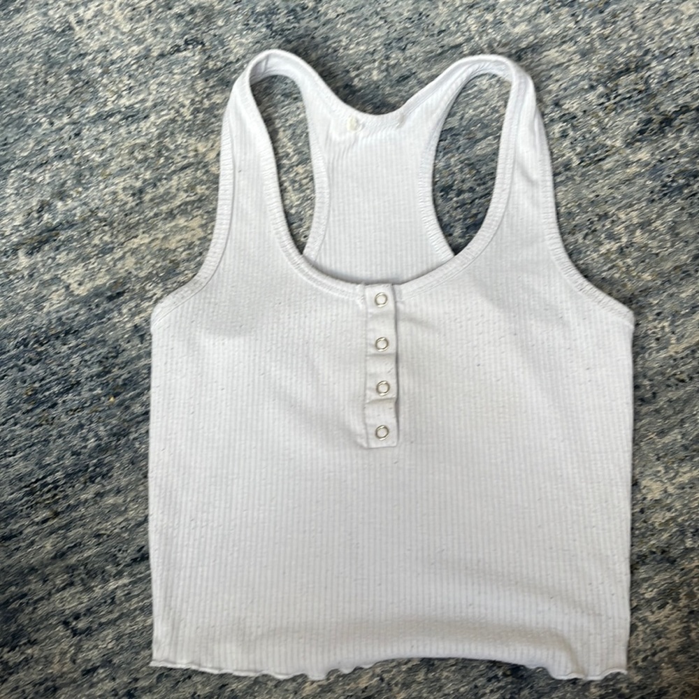 white tank, cuts off at waistline, buttons down the middle